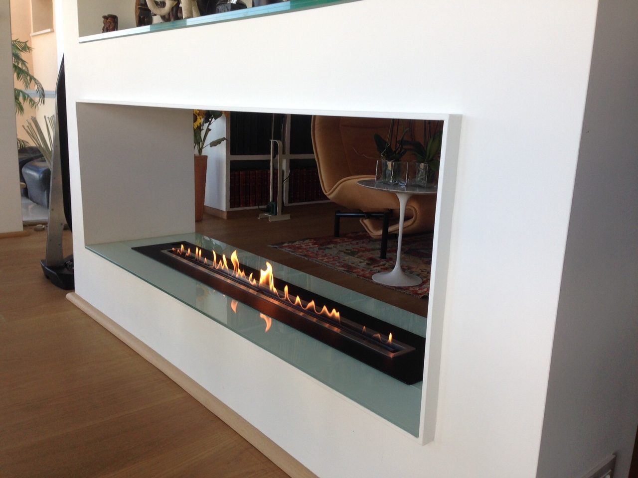 Remote-Controlled Ethanol Fireplace & Ethanol Burner Insert The AFIRE remote-controlled ethanol fireplace features a smart bioethanol burner insert